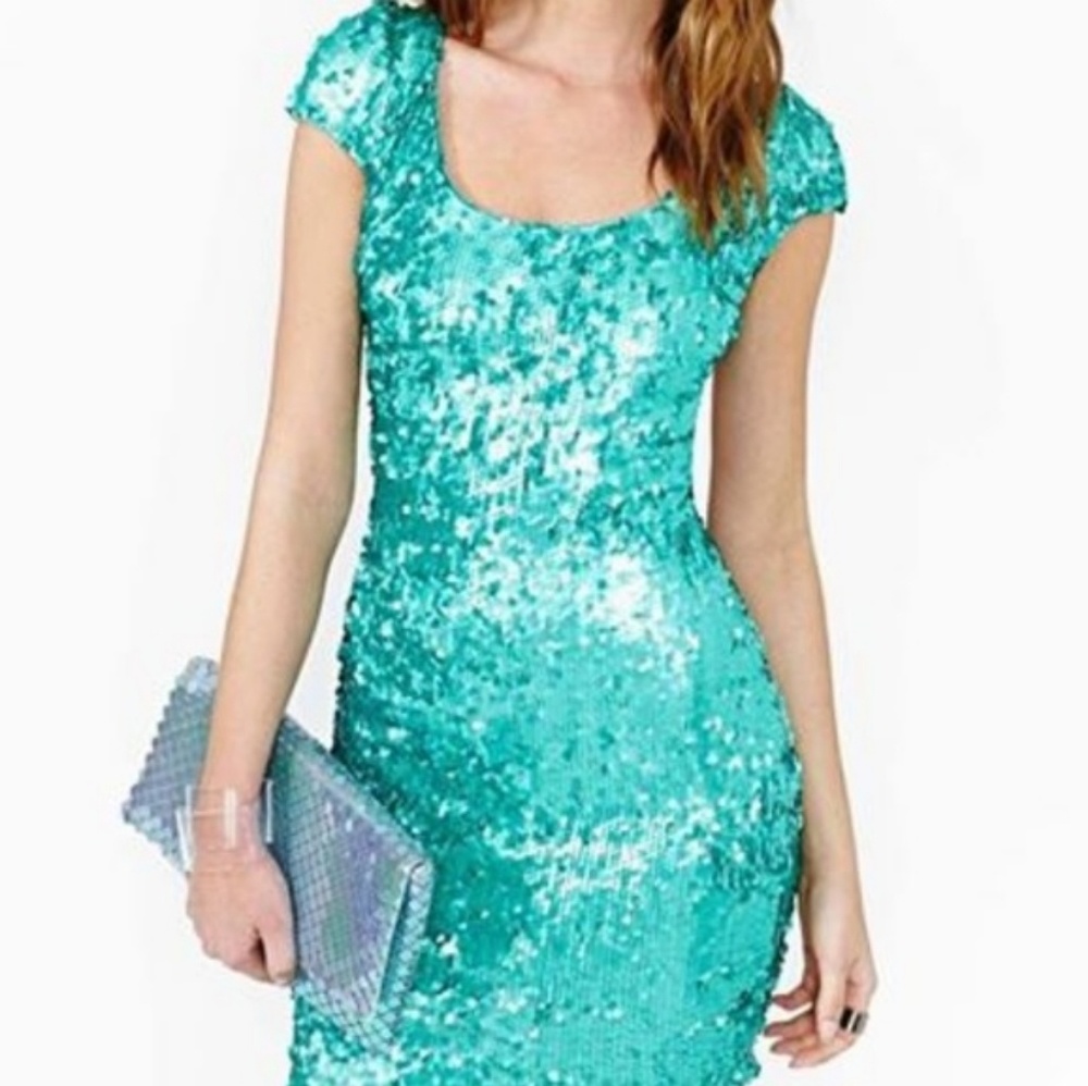 Sequin dress with gorgeous upper back cut out.